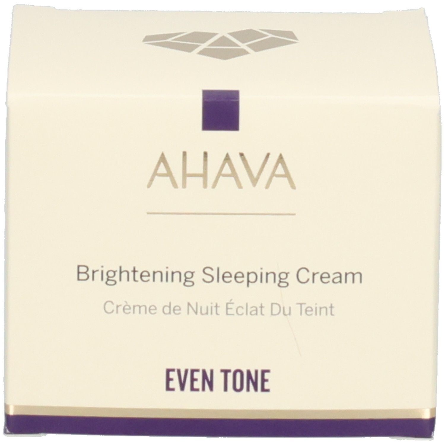 Karton mit Aufschrift AHAVA, Brightening Sleeping Cream. Weiß mit lila Akzenten.