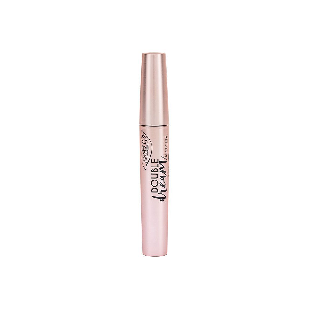 Flacon de mascara fermé. Récipient rose doré, écriture noire. Inscription: Double Dream Mascara.