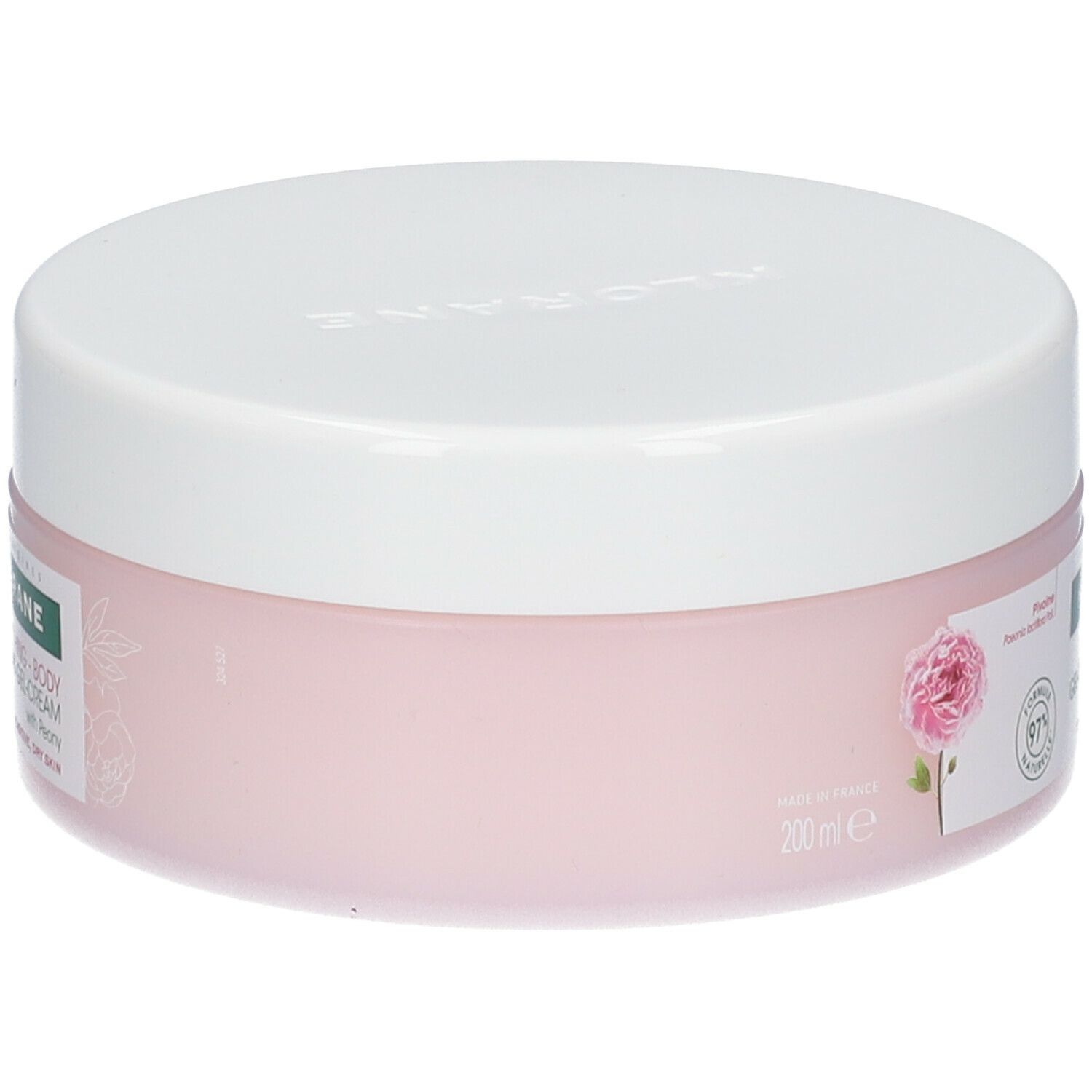Pot de crème rose avec couvercle blanc. Inscription: Klorane. Avec pivoine. 200ml. Fabriqué en France. Formule naturelle à 97%.