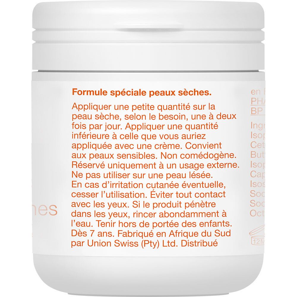 Rückseite des weißen Tiegels. Text mit Anwendungshinweisen in Orange.