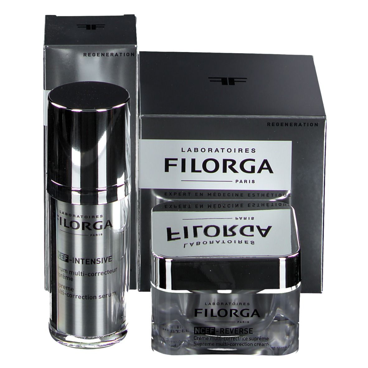 Set mit Serum und Creme. Silberne Flakons und Verpackungen mit FILORGA-Logo. Schwarze Kartons mit Produktnamen und Text.