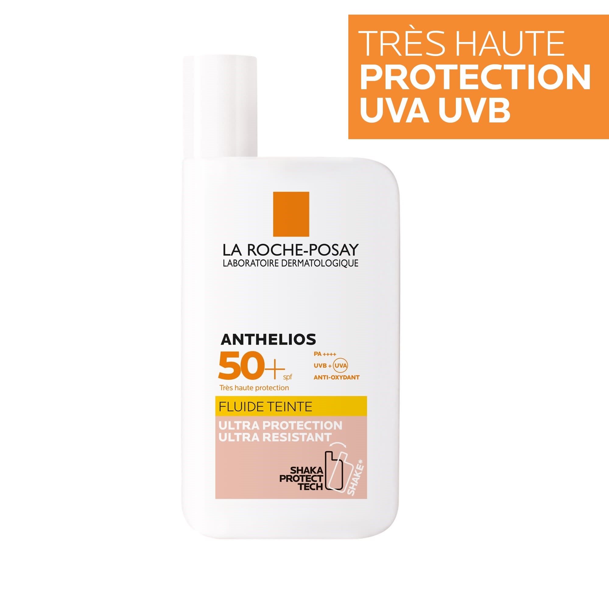Sonnencreme-Flüssigkeit mit SPF 50+. Weiße Flasche. Text: Très haute protection UVA UVB.