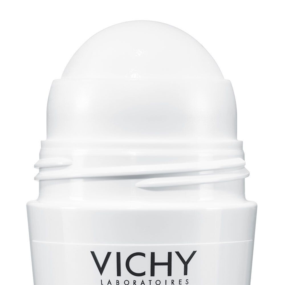 Gros plan de l'applicateur roll-on. Blanc, sphérique, avec ouvertures. Partie du roll-on Vichy.
