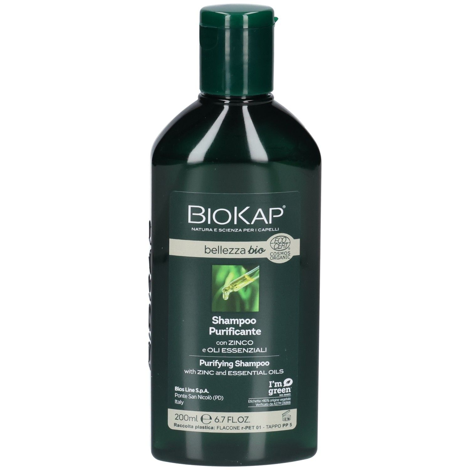 Flacon vert foncé avec bouchon vert. Inscription BIOKAP, Shampooing Purifiant, avec zinc et huiles essentielles. Certification.