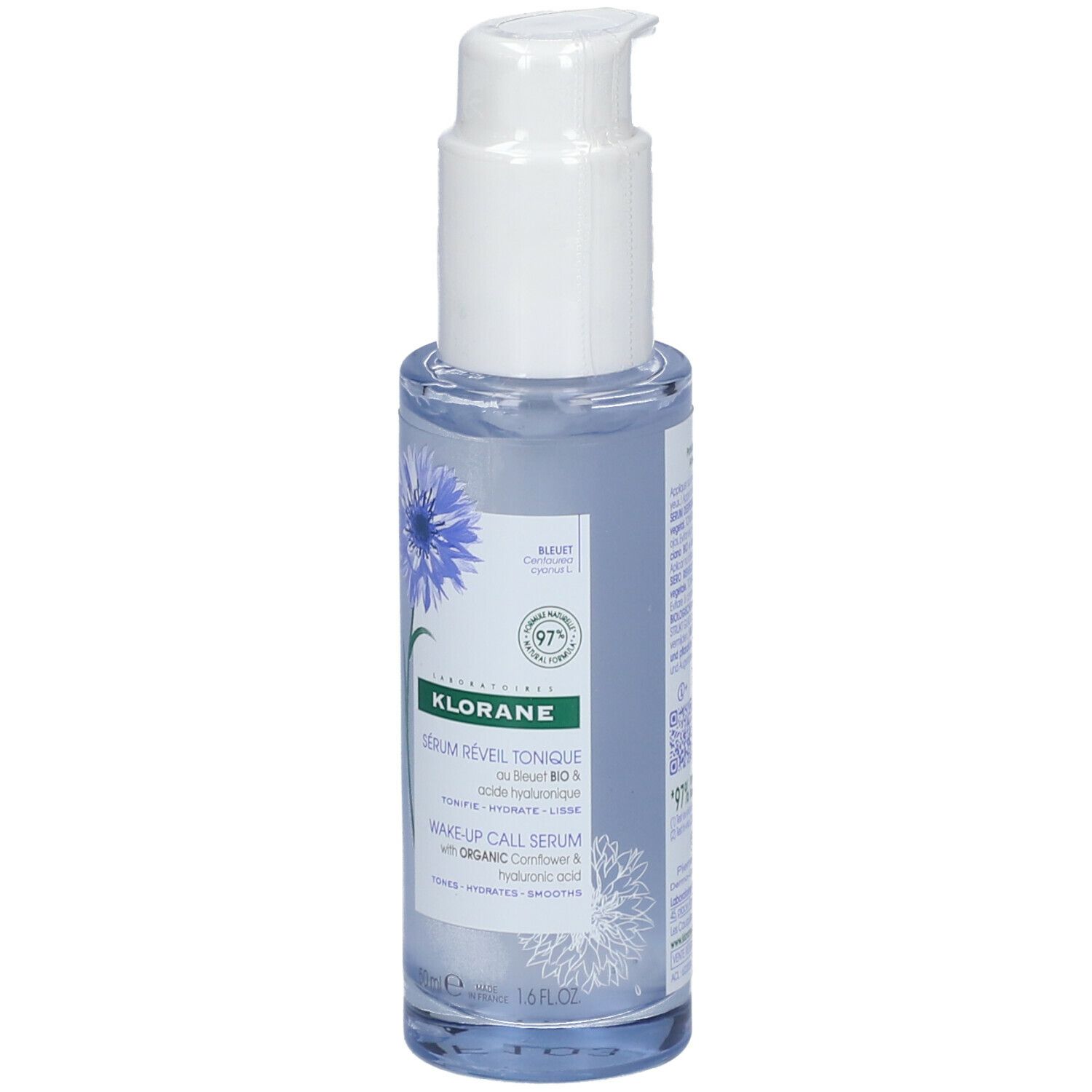 Blau-transparente Flasche mit weißem Pumpkopf. Aufschrift: KLORANE, Sérum Réveil Tonique, Wake-up Call Serum. Kornblume-Illustration.