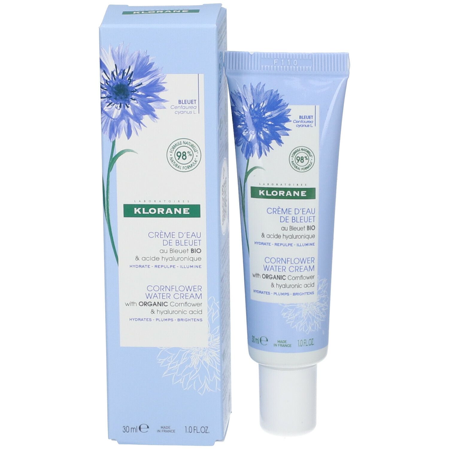 Boîte bleu clair avec fleur bleue et texte. Contient Crème d'Eau de Bleuet. 30ml. 98% d'ingrédients naturels.