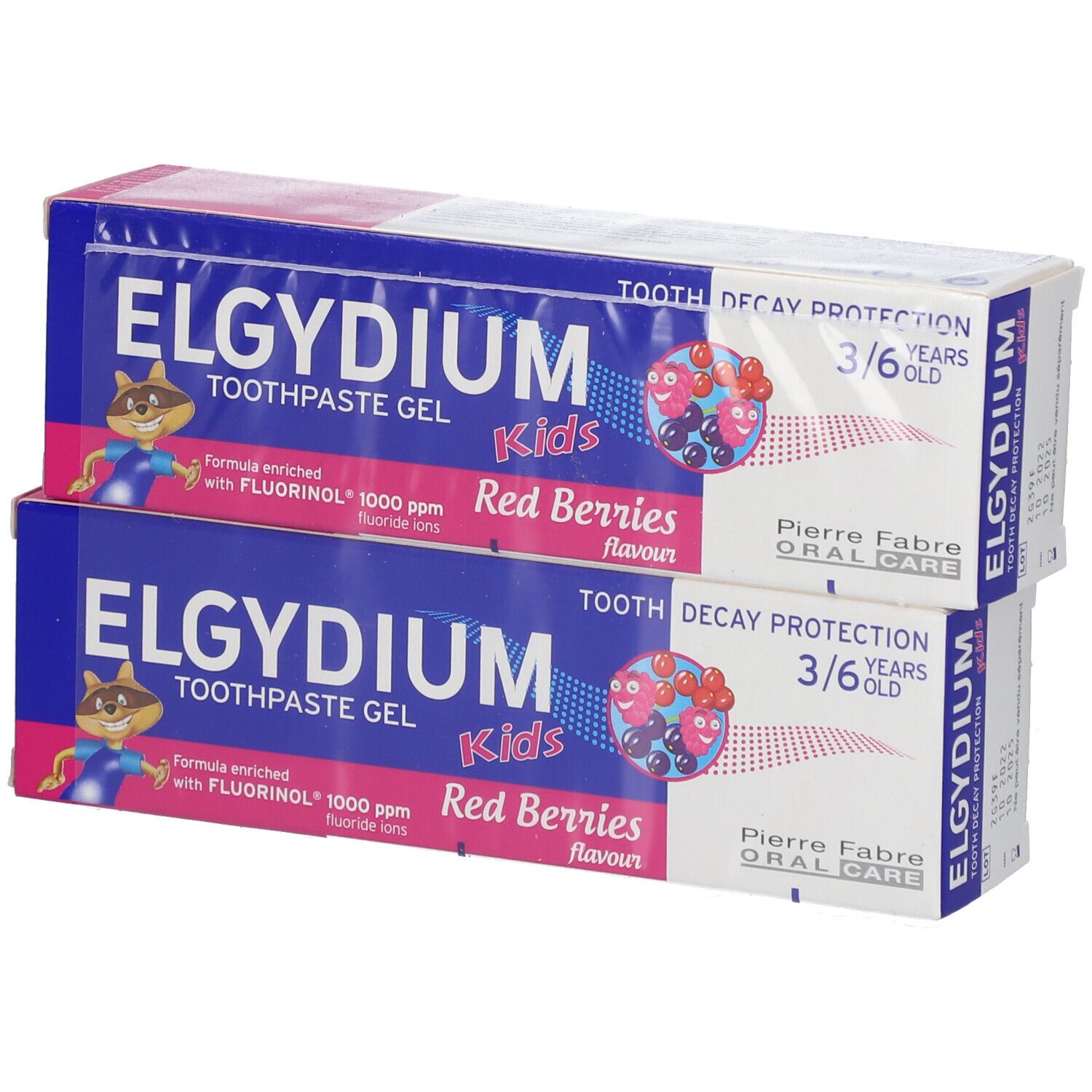 Zwei Zahnpasta-Packungen. Blaue und rosa Verpackung. Text: ELGYDIUM Kids, Red Berries, 3/6 Jahre.