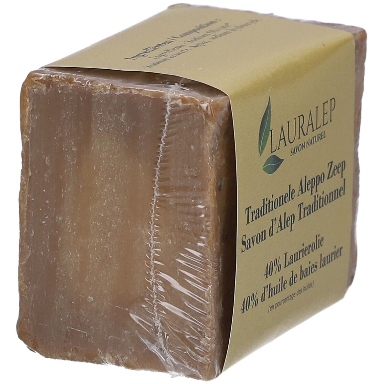 Bloc de savon rectangulaire emballé. Texte: Traditionelle Aleppo Zeep, 40% huile de baies de laurier.