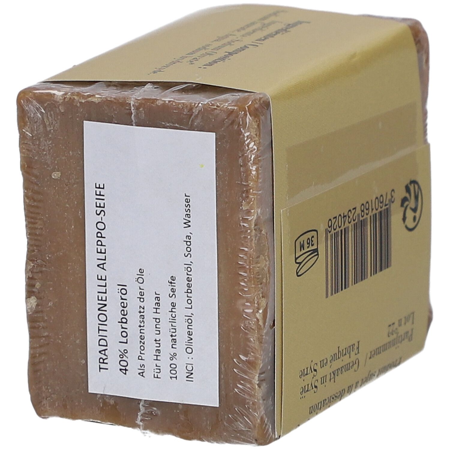 Bloc de savon emballé. Texte: Savon d'Alep traditionnel, 40% huile de baies de laurier, pour peau et cheveux.
