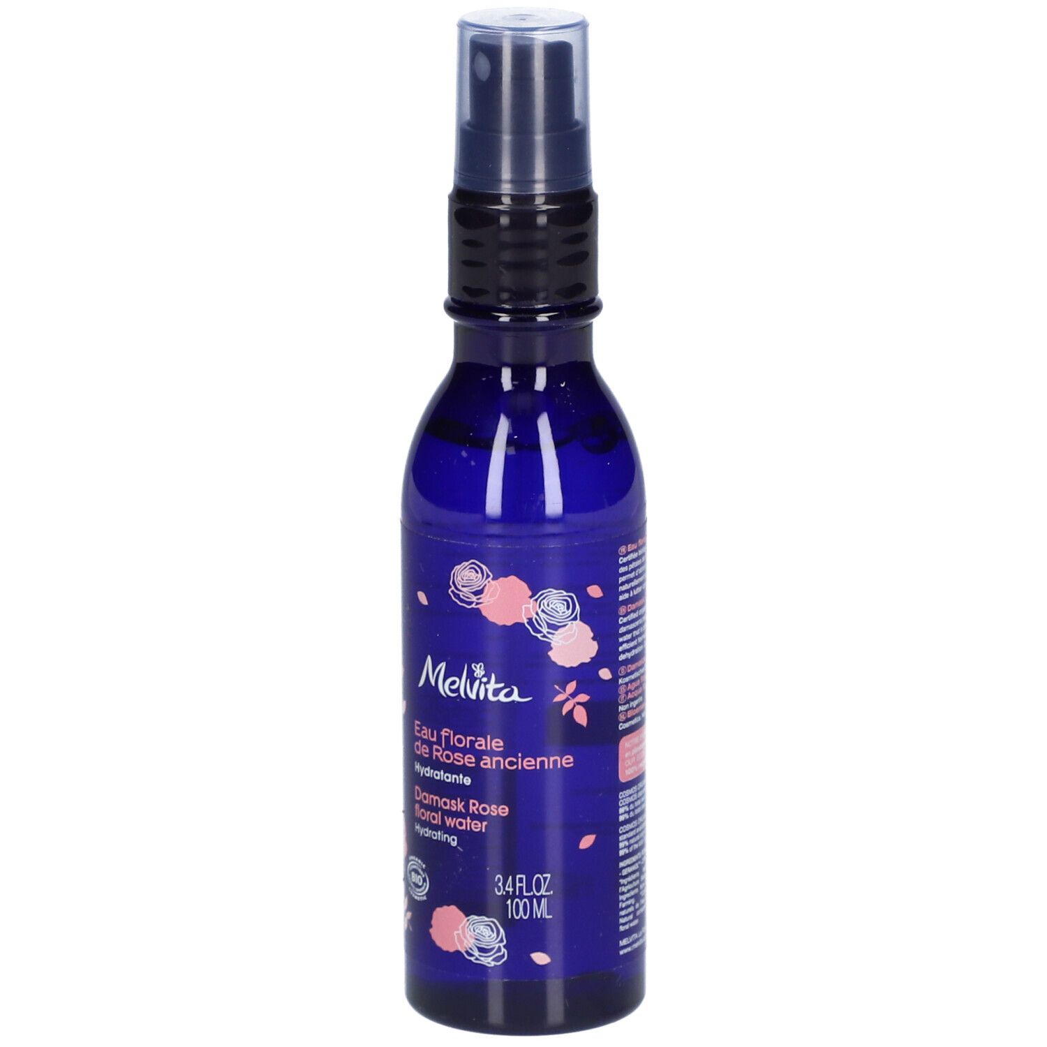Blaue Flasche mit Sprühkopf. Aufschrift: Melvita, Eau florale de Rose ancienne, Damask Rose floral water. 3.4 fl oz 100 ml. Bio-Zertifizierung.