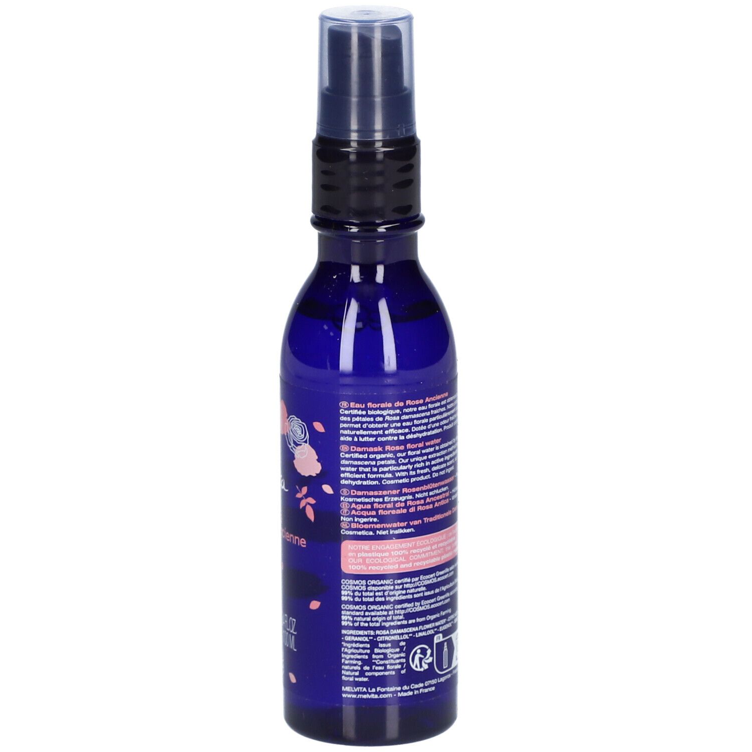 Blaue Flasche mit Sprühkopf. Rückseite mit Text. Aufschrift: Melvita, Eau florale de Rose ancienne, Damask Rose floral water. Bio-Zertifizierung.