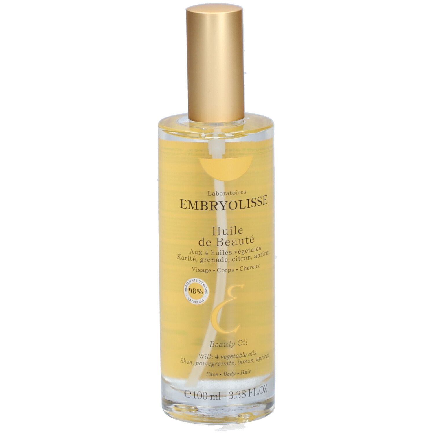 Klare Glasflasche mit goldfarbenem Sprühkopf. Aufschrift: EMBRYOLISSE Huile de Beauté. Enthält 4 Pflanzenöle.