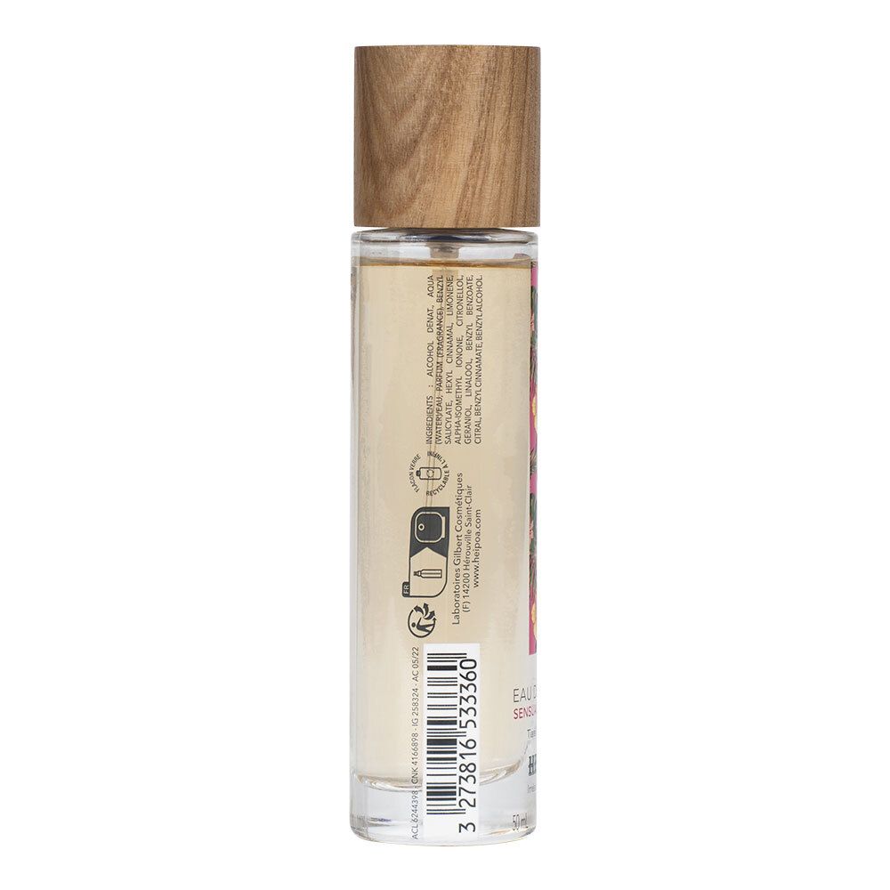 Flacon de parfum avec bouchon en bois. Dos avec texte et code-barres. Autocollant avec informations.