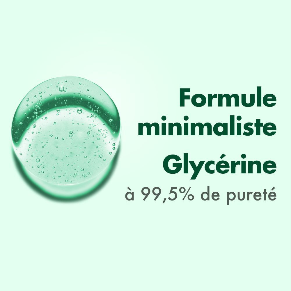 Nahaufnahme einer grünen Flüssigkeit. Text: Formule minimaliste Glycérine à 99,5% de pureté.