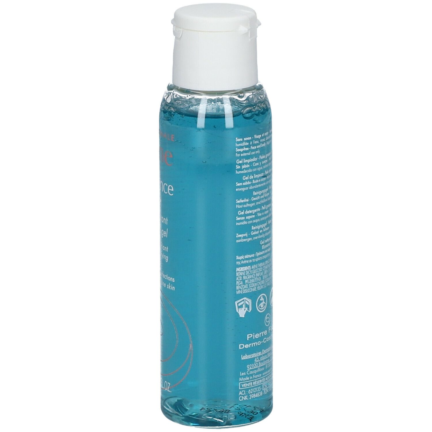 Seitenansicht einer blau-transparenten Flasche mit weißem Deckel. Text in mehreren Sprachen.