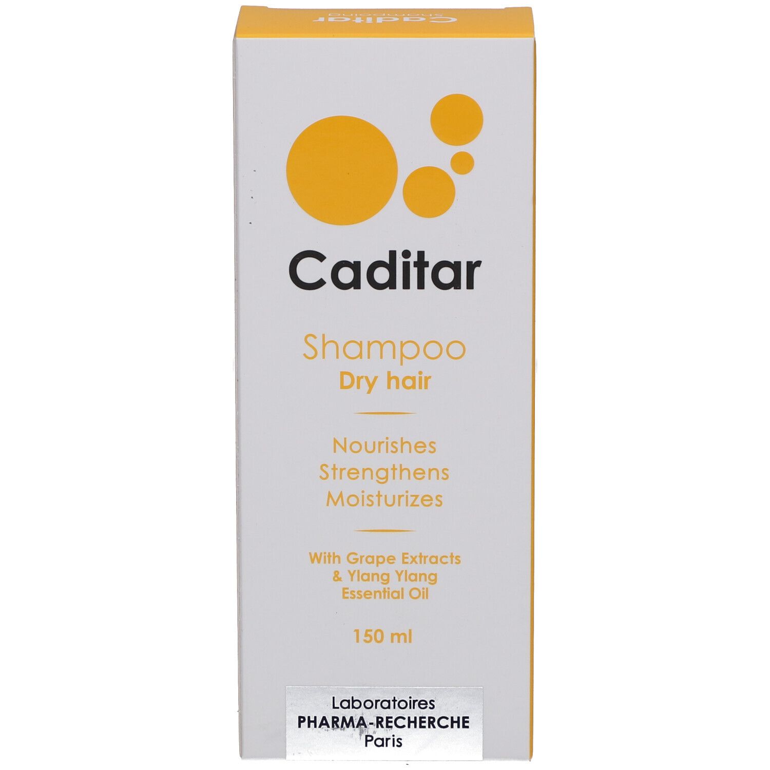 Emballage carton avec accent jaune. Inscription: Caditar, Shampoo Dry hair, Nourishes, Strengthens, Moisturizes.