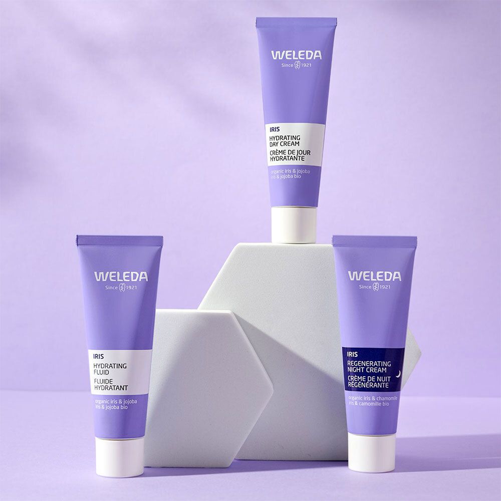 Produits de soin WELEDA à l'iris : crème de jour, fluide et crème de nuit.