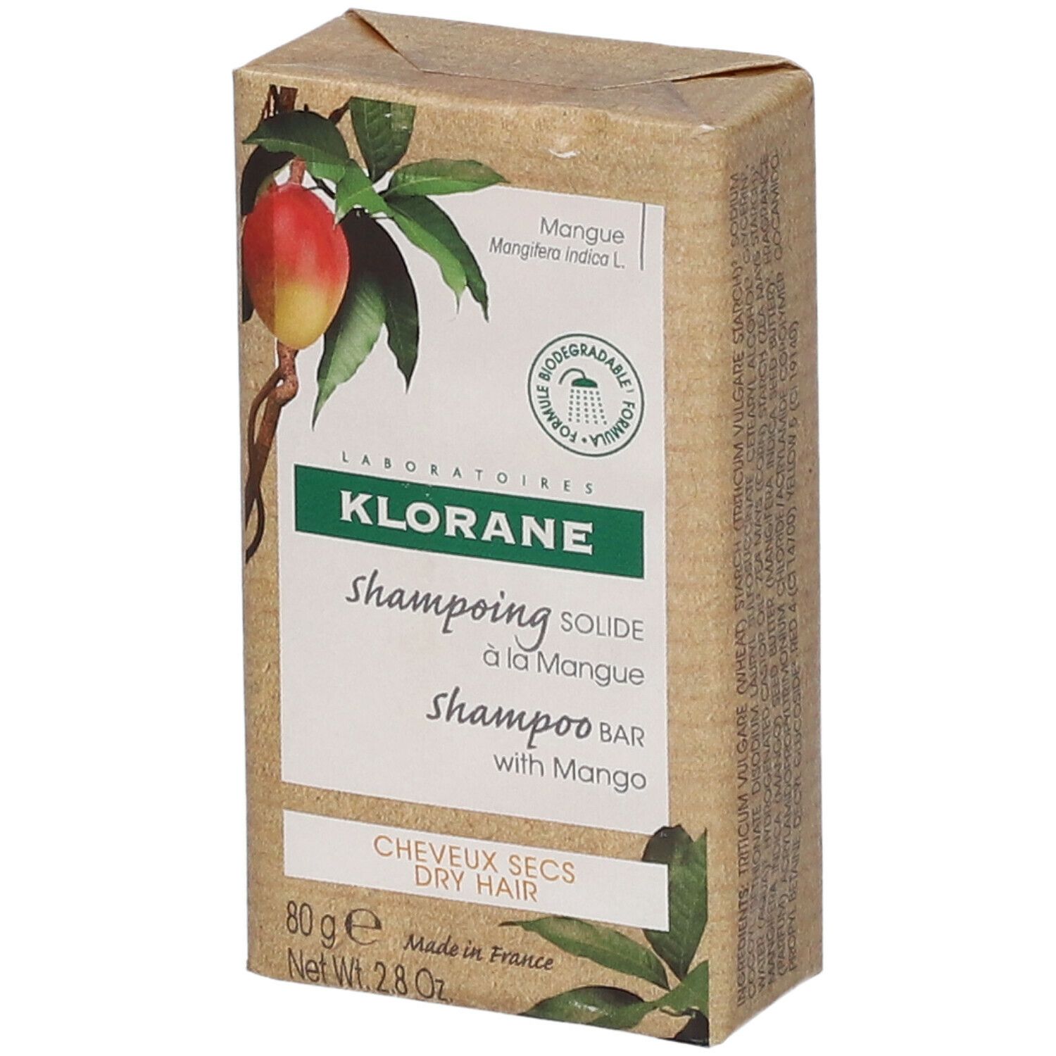 Emballage en carton avec illustration de mangue et logo KLORANE. Contient un shampooing solide à la mangue.