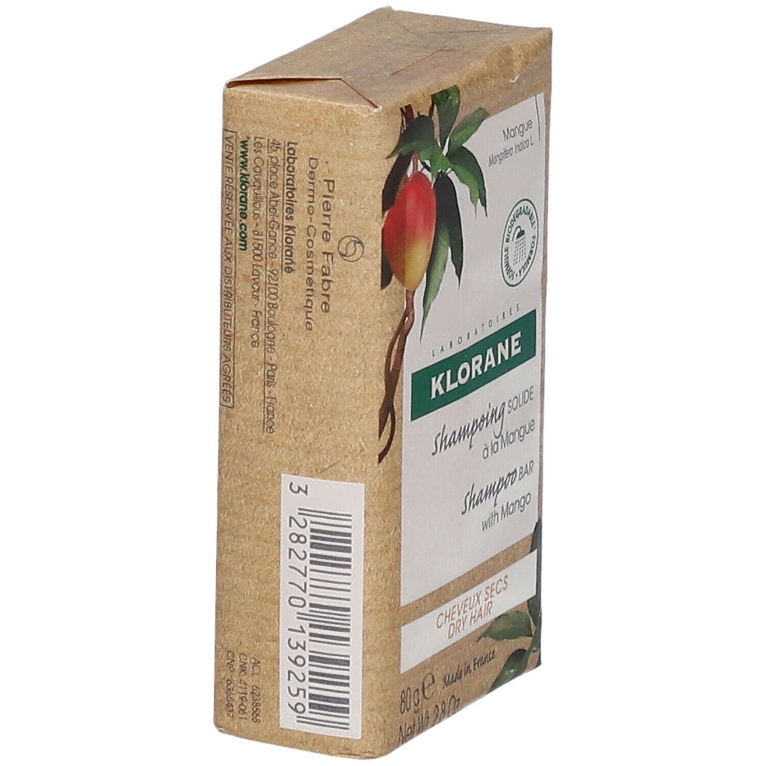 Emballage en carton avec illustration de mangue et logo KLORANE. Contient un shampooing solide à la mangue.