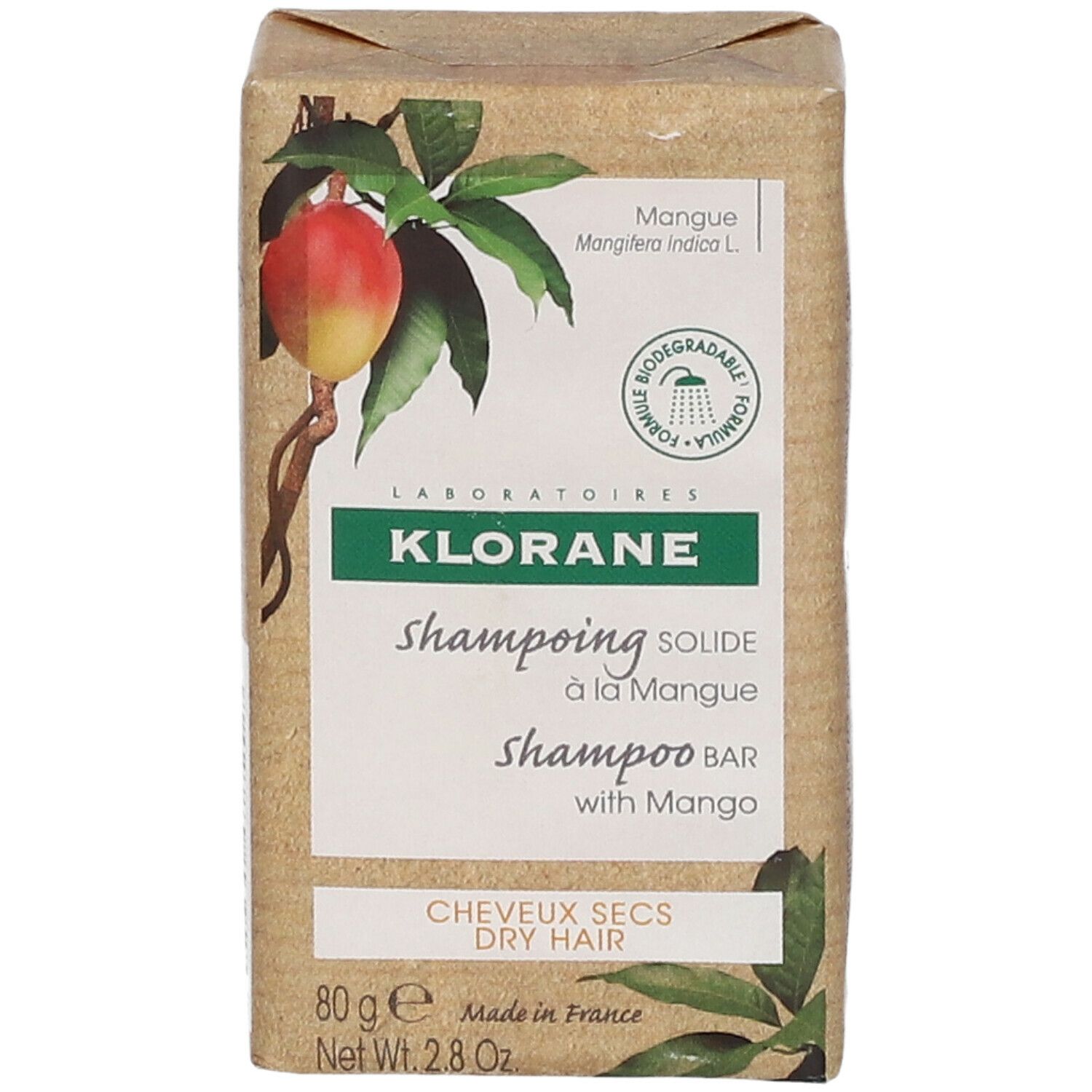Emballage en carton avec illustration de mangue et logo KLORANE. Contient un shampooing solide à la mangue.