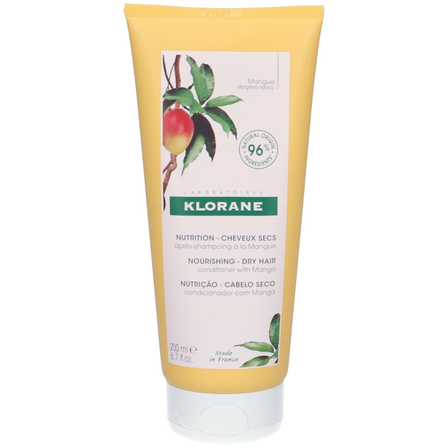 Tube jaune avec bouchon blanc. Illustration de mangue, logo Klorane, texte pour cheveux secs. 96% ingrédients naturels.