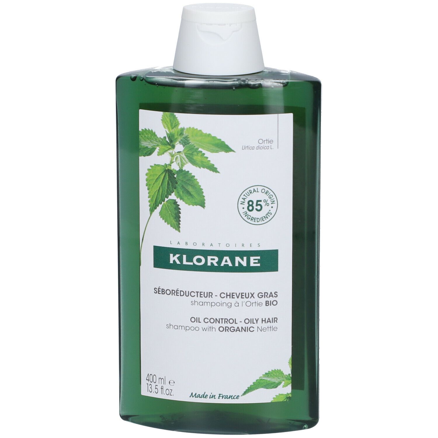 Flacon vert avec bouchon blanc. Logo KLORANE. Texte : Séborégulateur, pour cheveux gras.