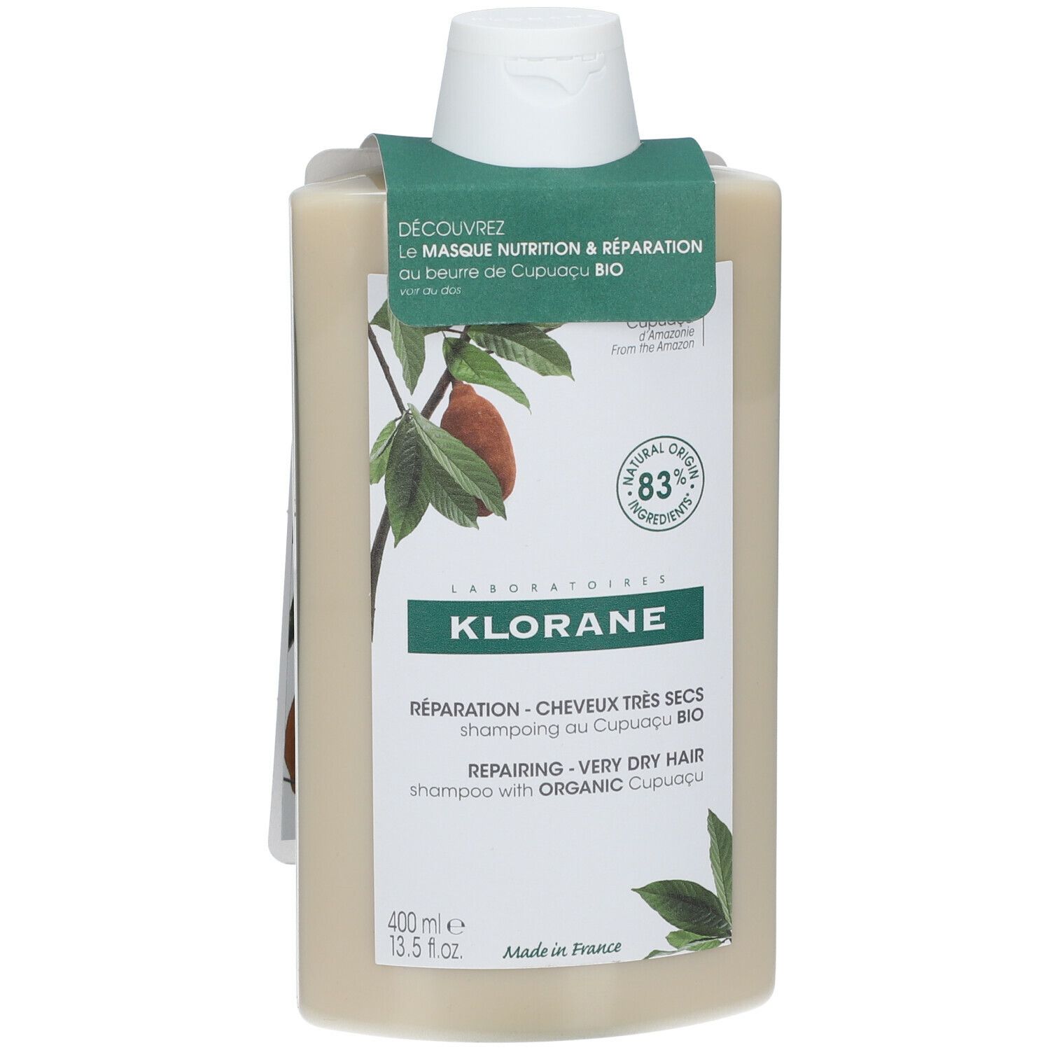 Flacon de shampooing avec étiquette. Flacon beige à bouchon blanc. Étiquette avec logo et texte. Étiquette avec texte.