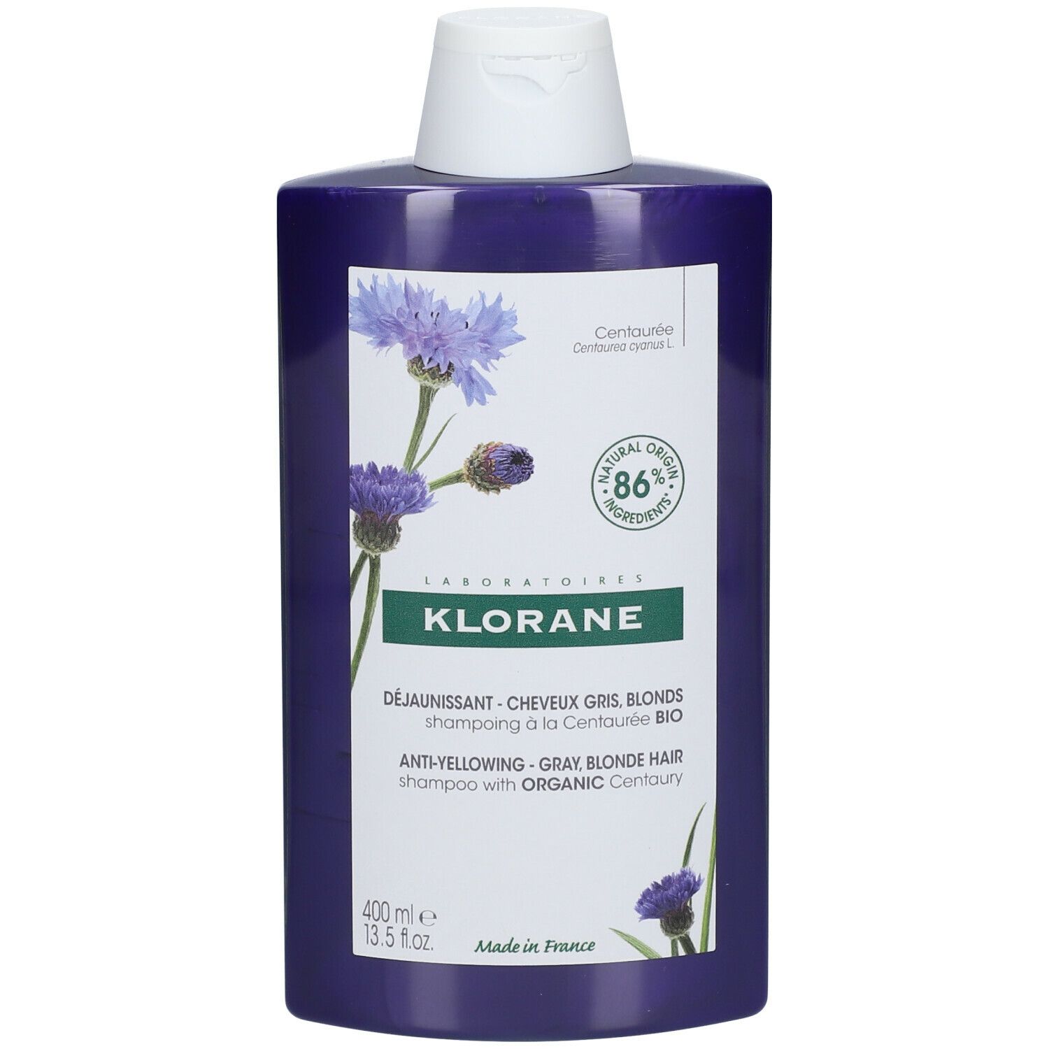 Violette Shampoo-Flasche mit weißem Deckel. Aufschrift: KLORANE, Anti-Gelbstich-Shampoo für graues und blondes Haar mit Bio-Tausendgüldenkraut.