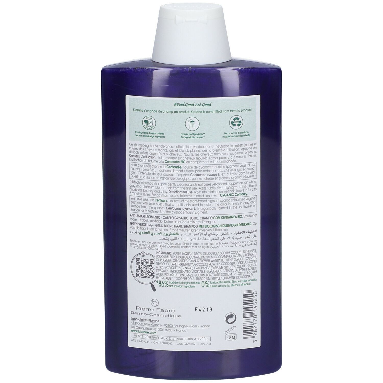 Rückseite der violetten Shampoo-Flasche. Text mit Inhaltsstoffen, Anwendungshinweisen und Recycling-Symbolen. QR-Code und Herstellerinformationen.