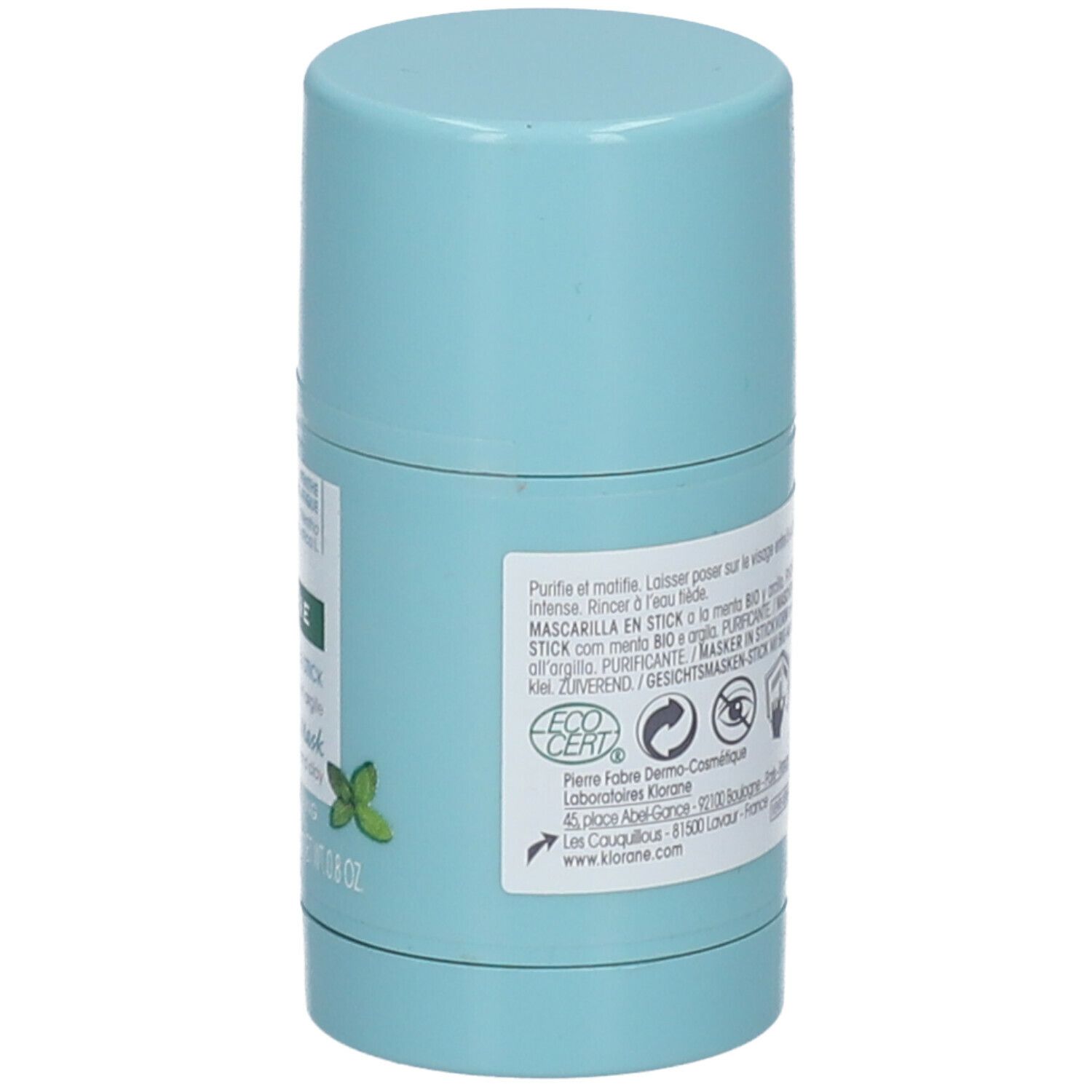 Dos du masque en stick bleu clair. Texte multilingue. Logos cosmétiques et de recyclage.