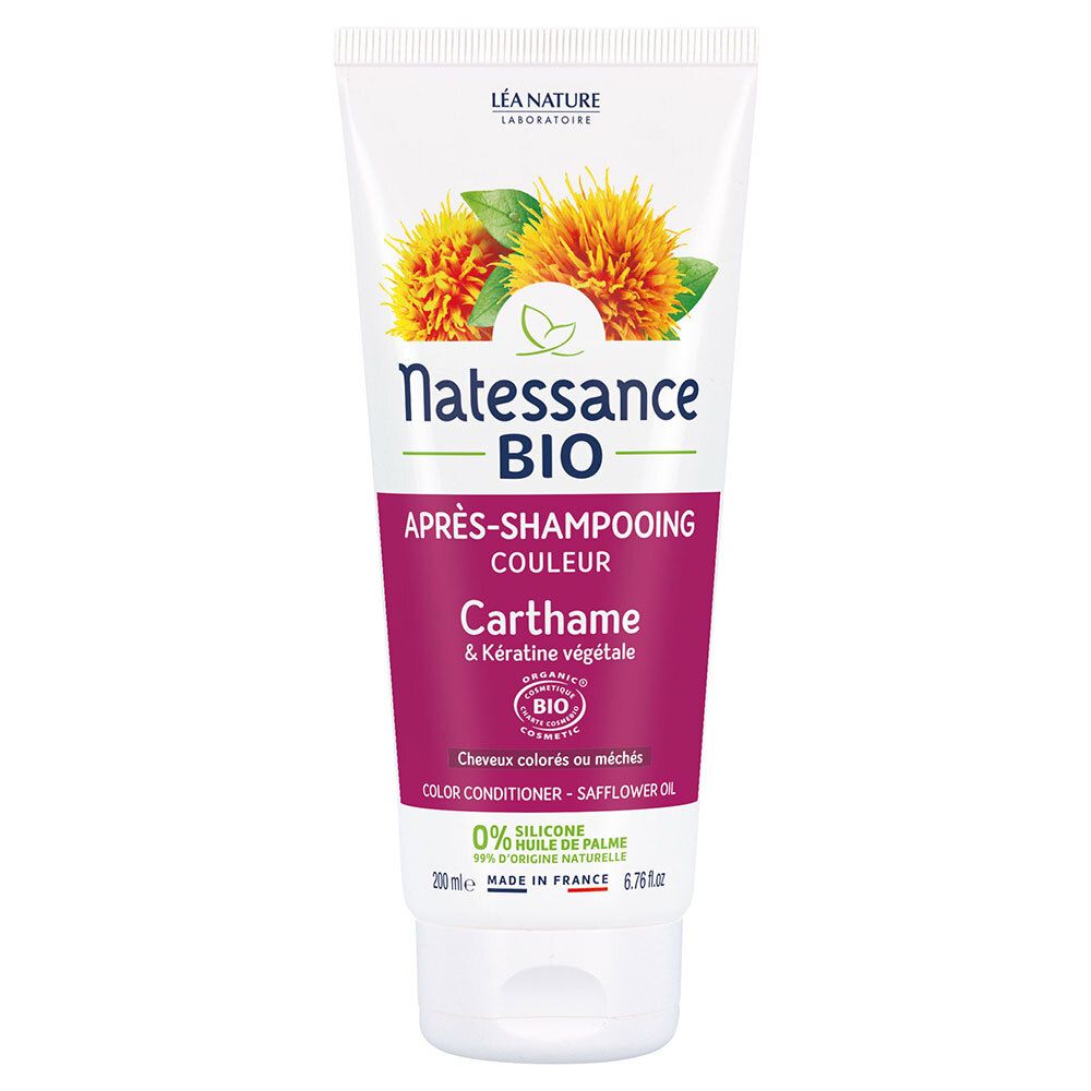 Tube blanc. Natessance Bio Après-shampooing couleur, Carthame & Kératine végétale. Illustration de fleurs. Label bio.
