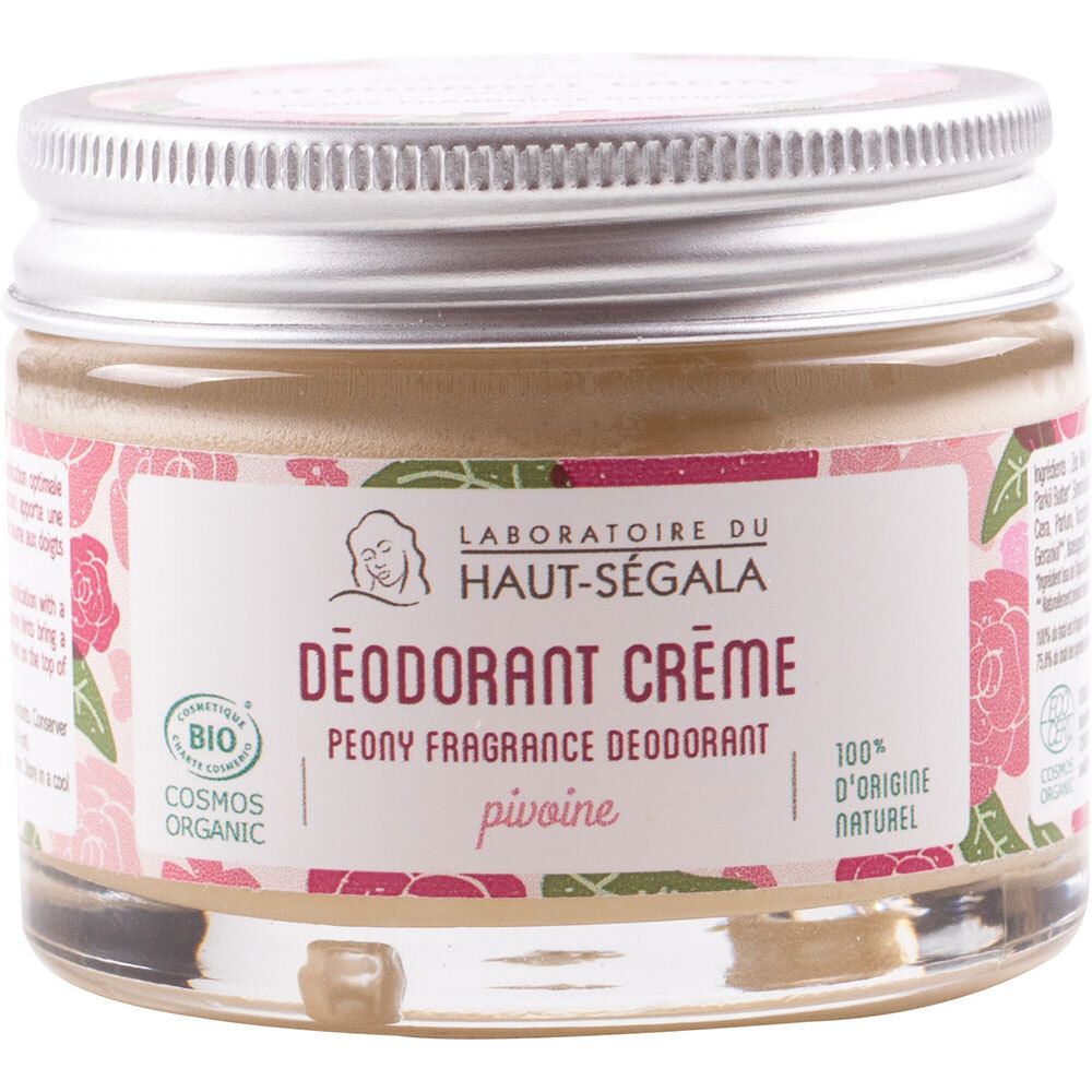 Déodorant crème en pot. Étiquette avec logo, texte et motif floral. Certification 'Cosmos Organic'.
