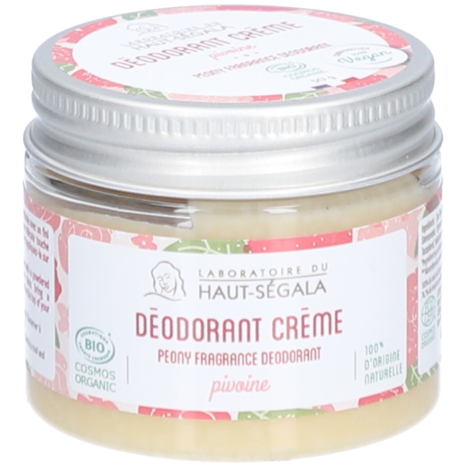 Déodorant crème en pot avec couvercle argenté. Étiquette avec logo, texte et motif floral. Label végan.