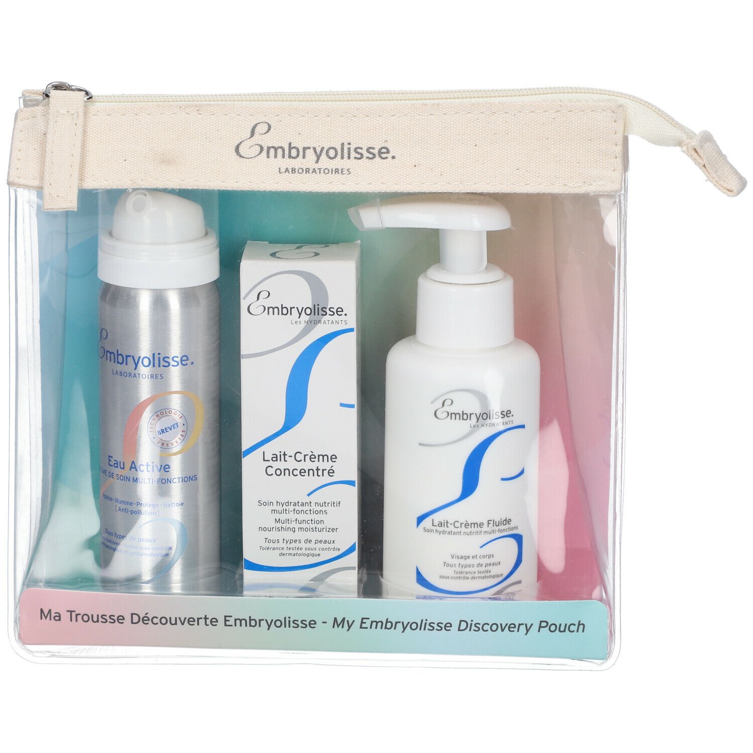 Klarsicht-Kosmetiktasche mit drei Produkten: Spray, Creme-Tube und Lotion. Aufdrucke: Embryolisse, Lait-Crème, Eau Active.