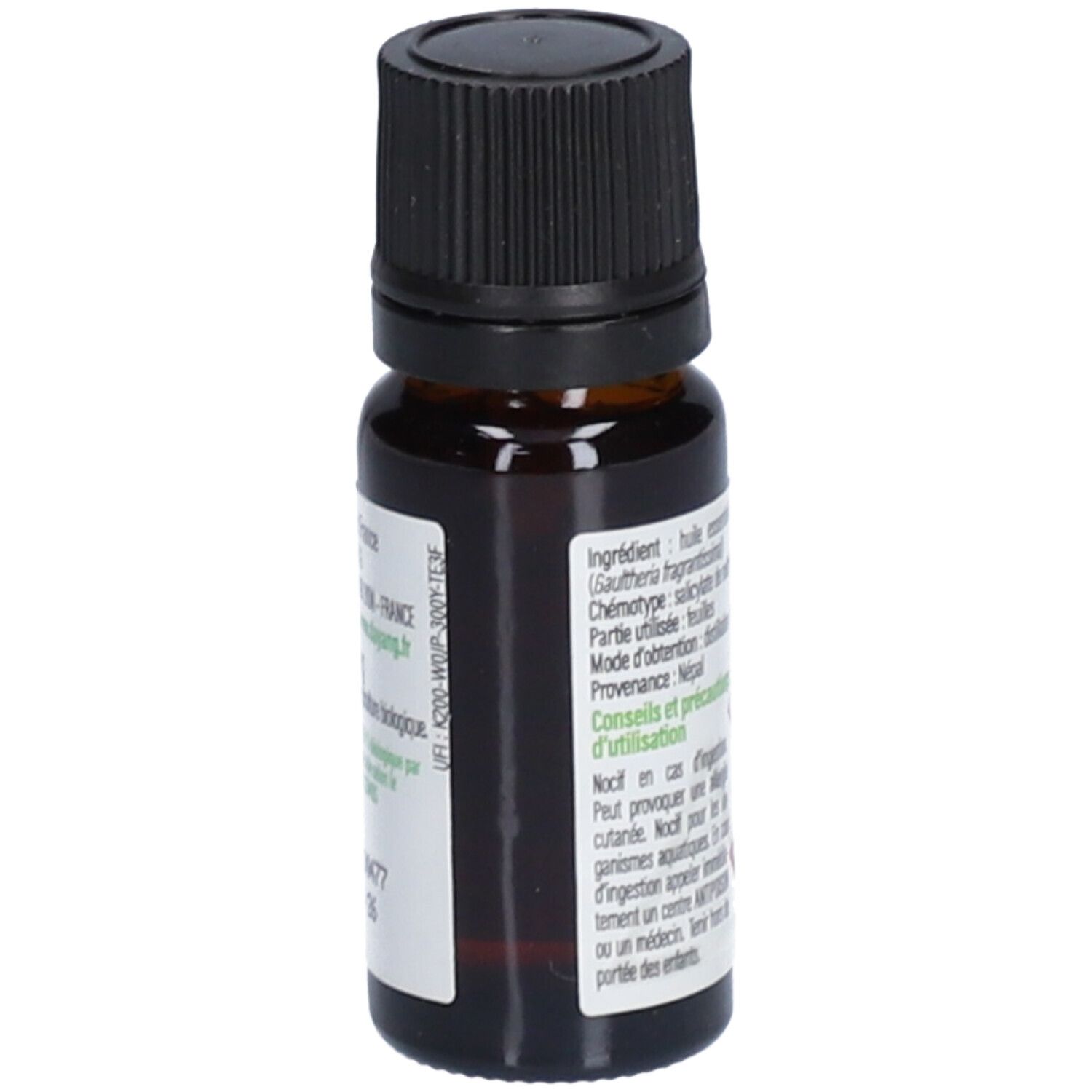 Flacon en verre brun avec bouchon noir. Étiquette avec texte: Huile essentielle Chémotypée Gaulthérie. Ingrédients, origine, précautions.