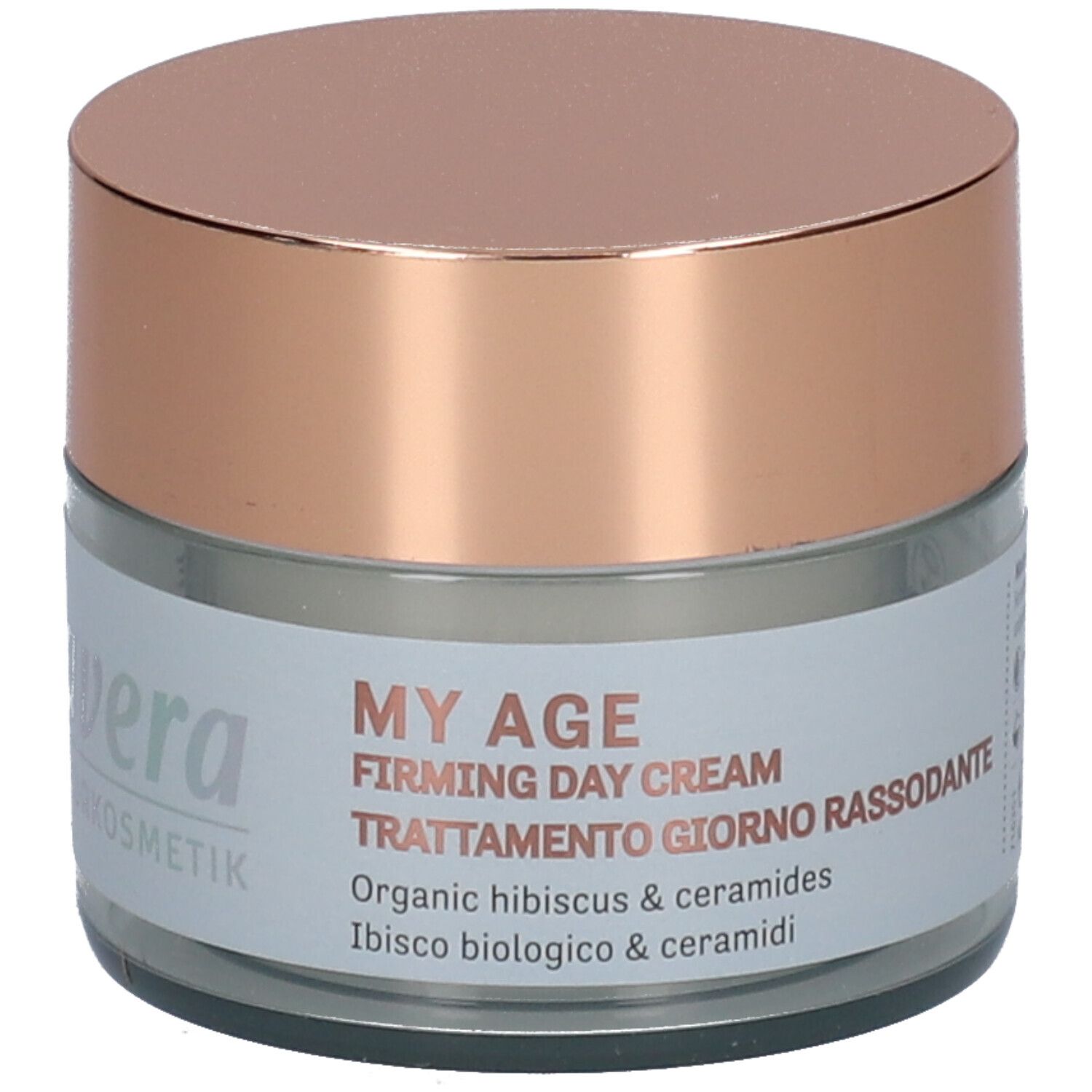 Pot en verre avec couvercle rose. Inscription: MY AGE, Firming Day Cream, Trattamento giorno rassodante. Avec ingrédients.