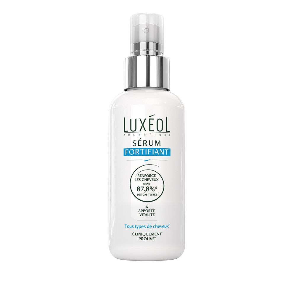 Weiße Flasche mit Zerstäuber. LUXÉOL Serum Fortifiant. Text: Renforce les cheveux, 87,8% des cas testés.