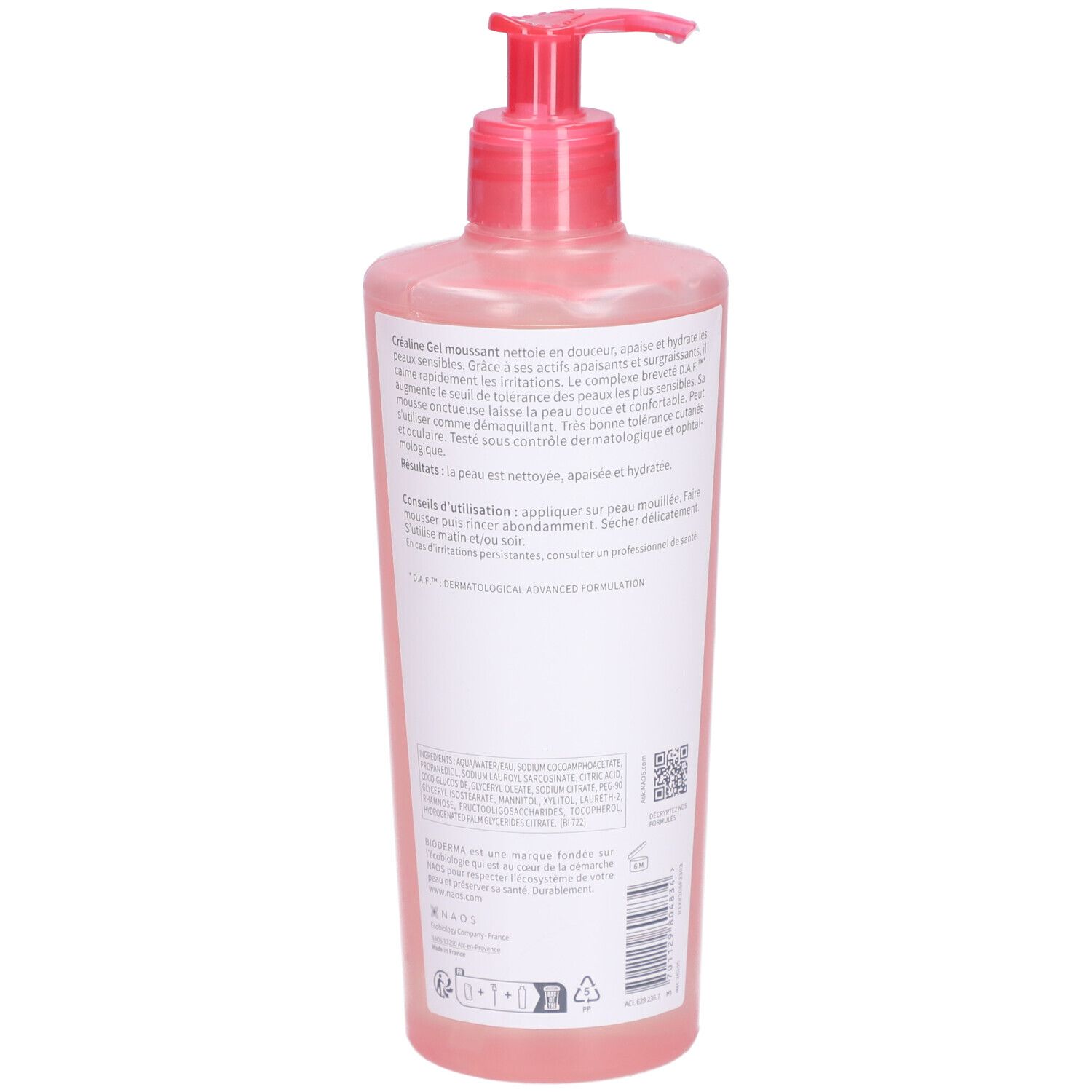 Rückansicht der rosa Flasche mit Pumpe. Text auf Etikett. Produktinformationen und Anwendungshinweise.