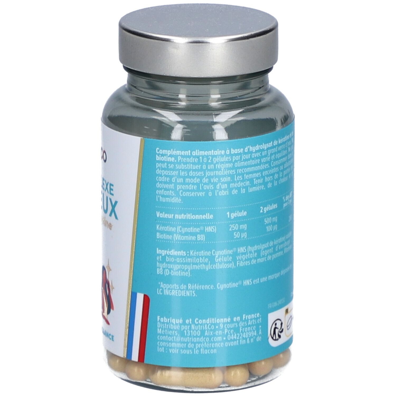 Dos du flacon avec informations nutritionnelles. Inscription: Le Complexe Cheveux. Ingrédients et utilisation.