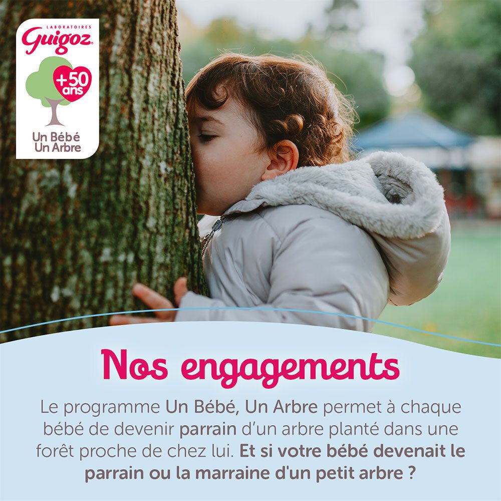 Guigoz Logo mit Baum-Symbol und Text 'Un Bébé, Un Arbre'. Kind umarmt einen Baum.