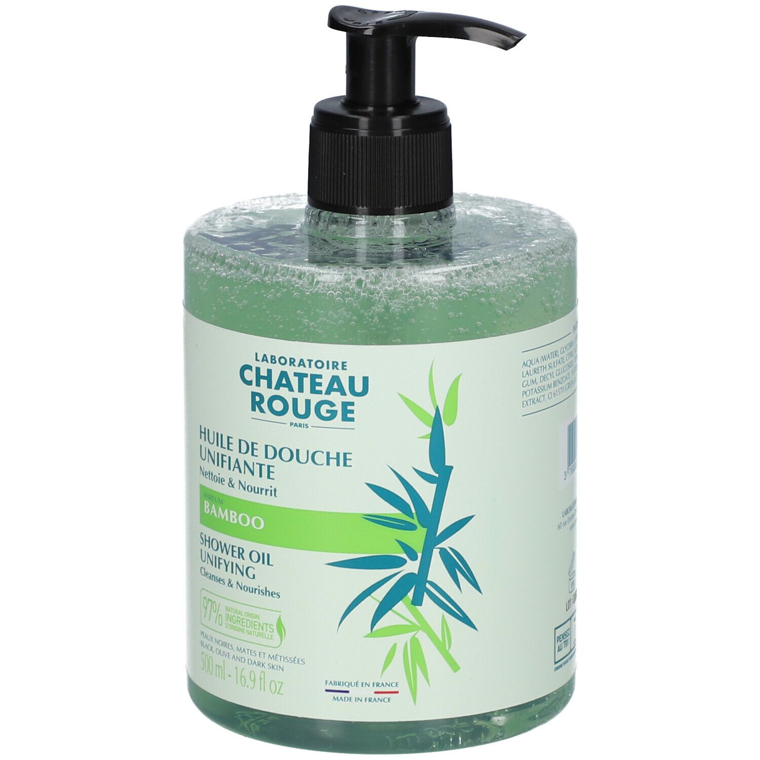Transparente Flasche mit grünem Duschöl. Schwarzer Pumpverschluss. Aufschrift: Laboratoire Château Rouge, Bamboo, Shower Oil.