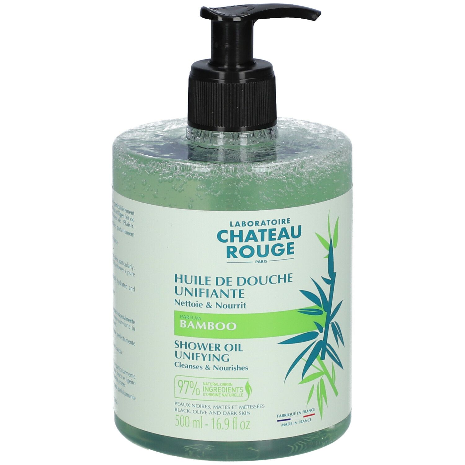 Transparente Flasche mit grünem Duschöl. Schwarzer Pumpverschluss. Aufschrift: Laboratoire Château Rouge, Bamboo, Shower Oil.