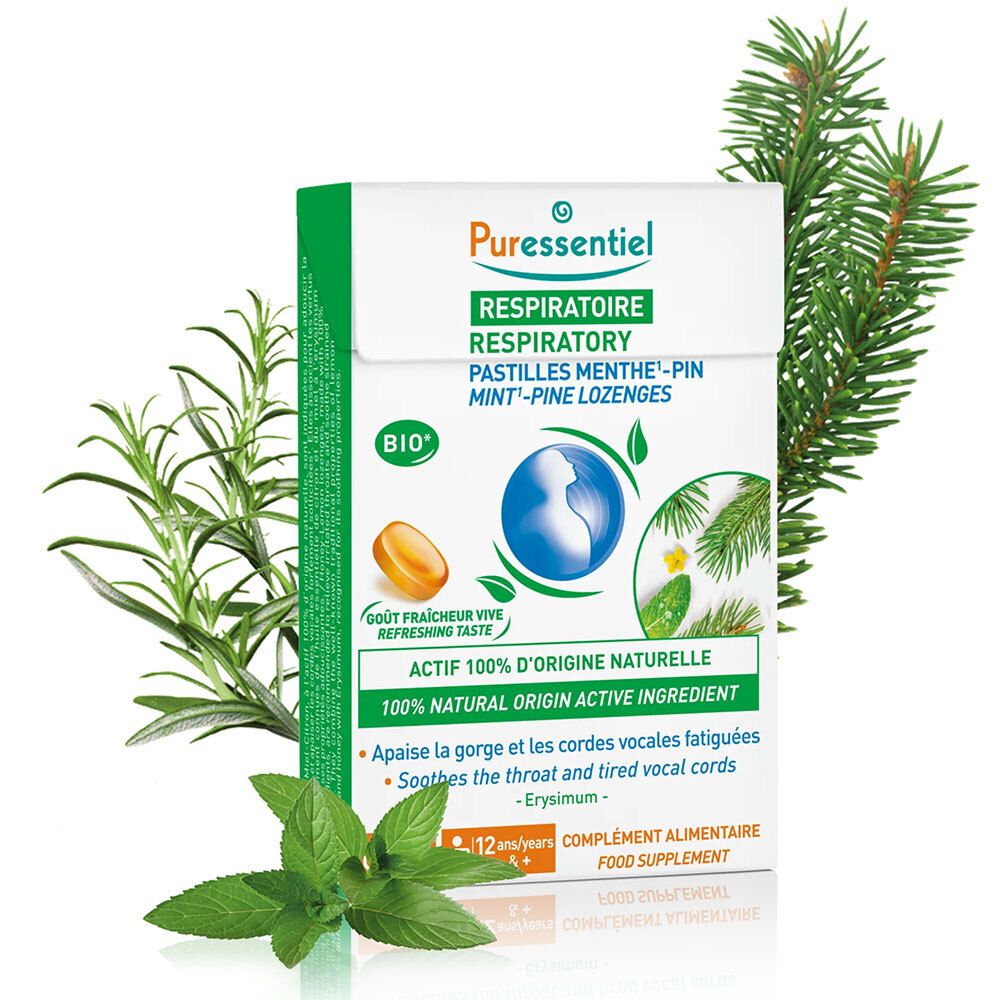 Verpackung mit Pastillen. Aufschrift: RESPIRATOIRE, Pastilles Menthe-Pin. Bio-Zertifizierung. Kräuter im Hintergrund.