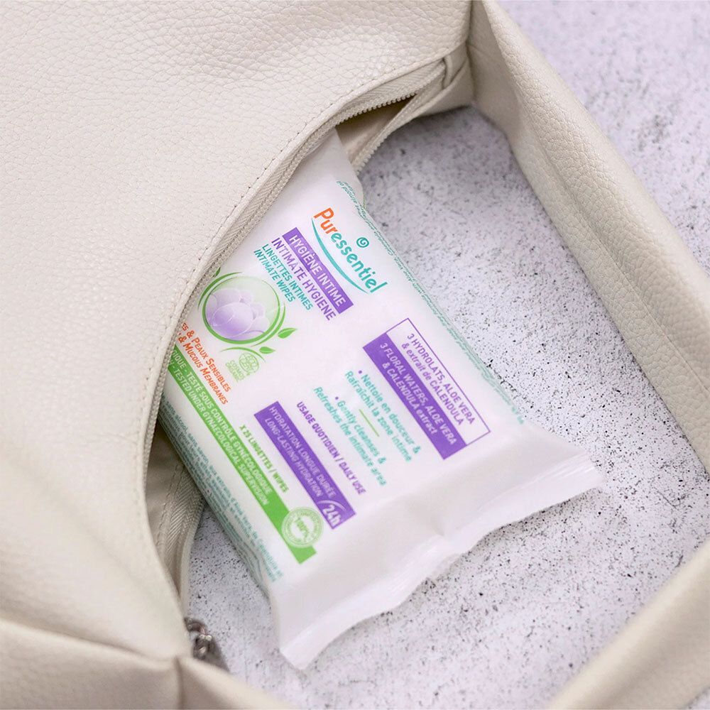 Packung Intim-Reinigungstücher in einer weißen Handtasche. Text: HYGIÈNE INTIME. Aufdruck: 25 Tücher. Mit Aloe Vera und Calendula-Extrakt.