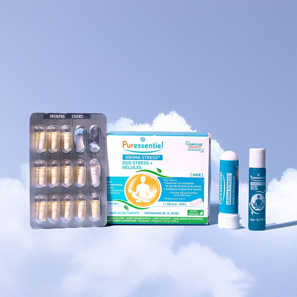 Boîte de gélules, inhalateur et produit. Texte: Puressentiel AROMA STRESS.