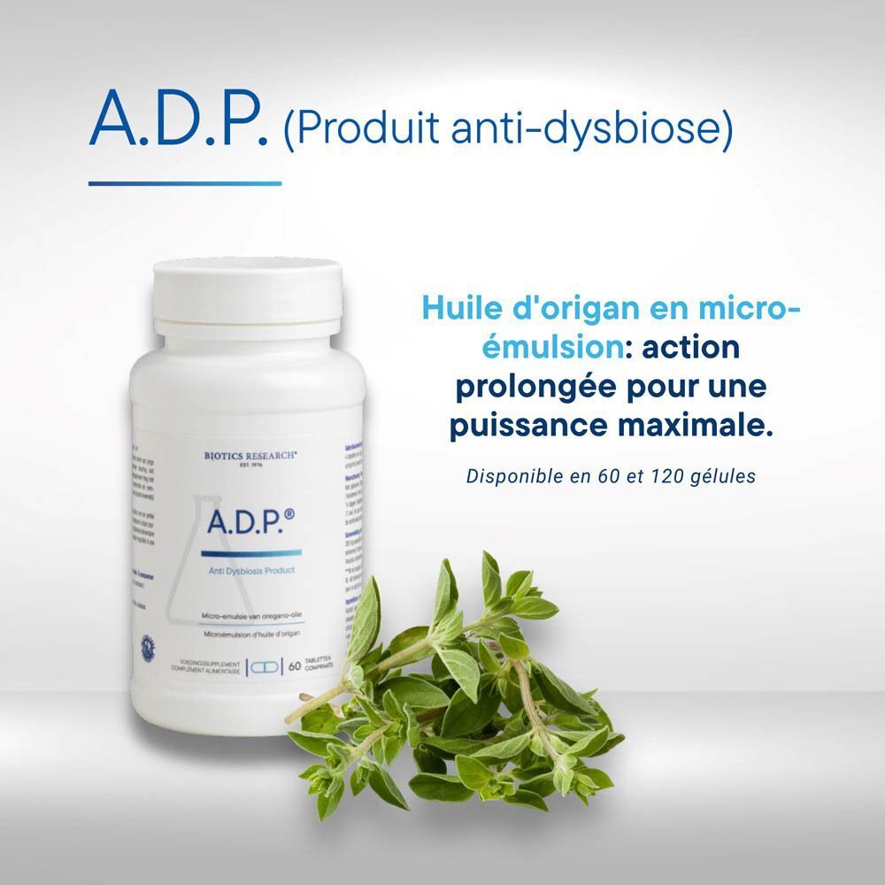 Flacon d'A.D.P. Biotics, 60 gélules, avec quelques comprimés et des branches d'origan.