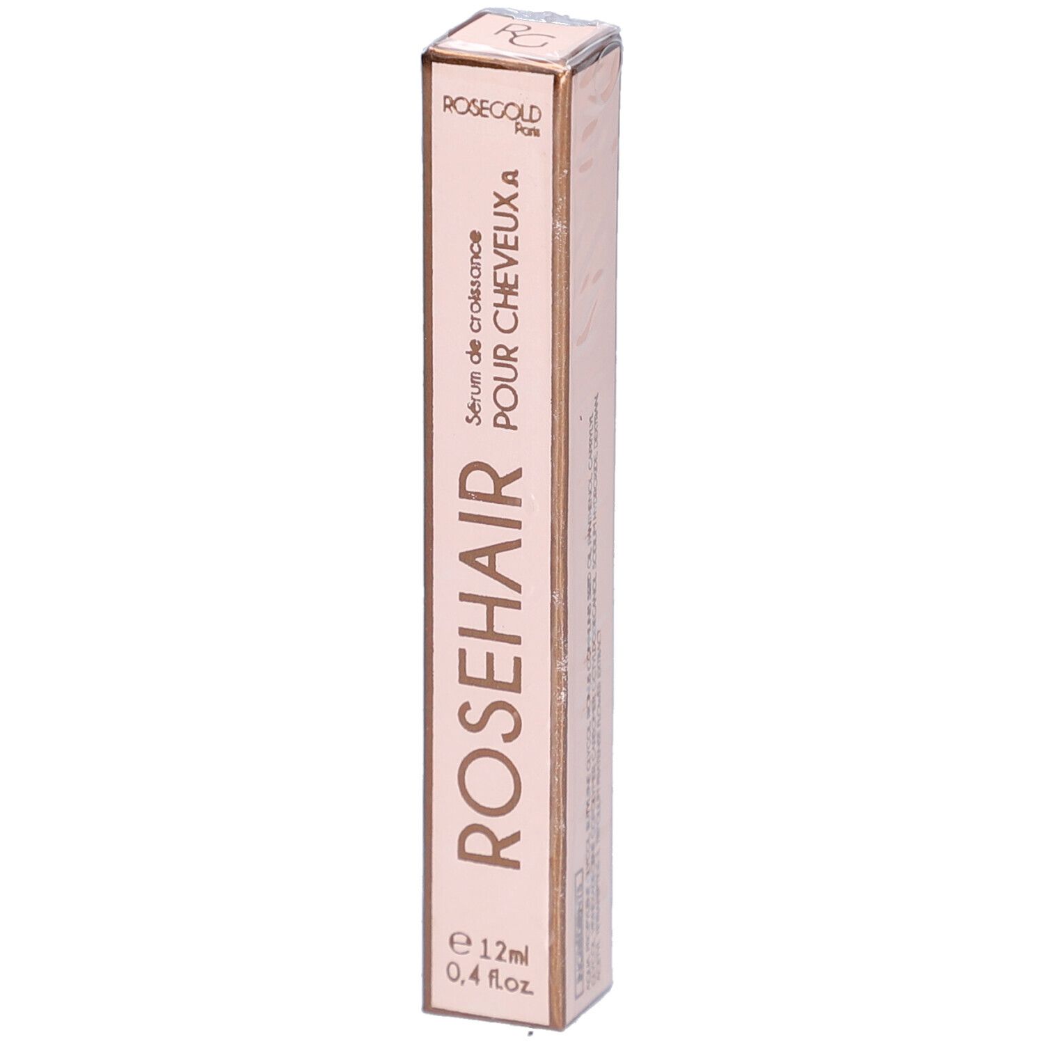 Schmale, rosafarbene Verpackung. Aufschrift: ROSEHAIR, Serum de croissance POUR CHEVEUX A, e 12ml, 0,4 fl.oz. ROSEGOLD Paris.