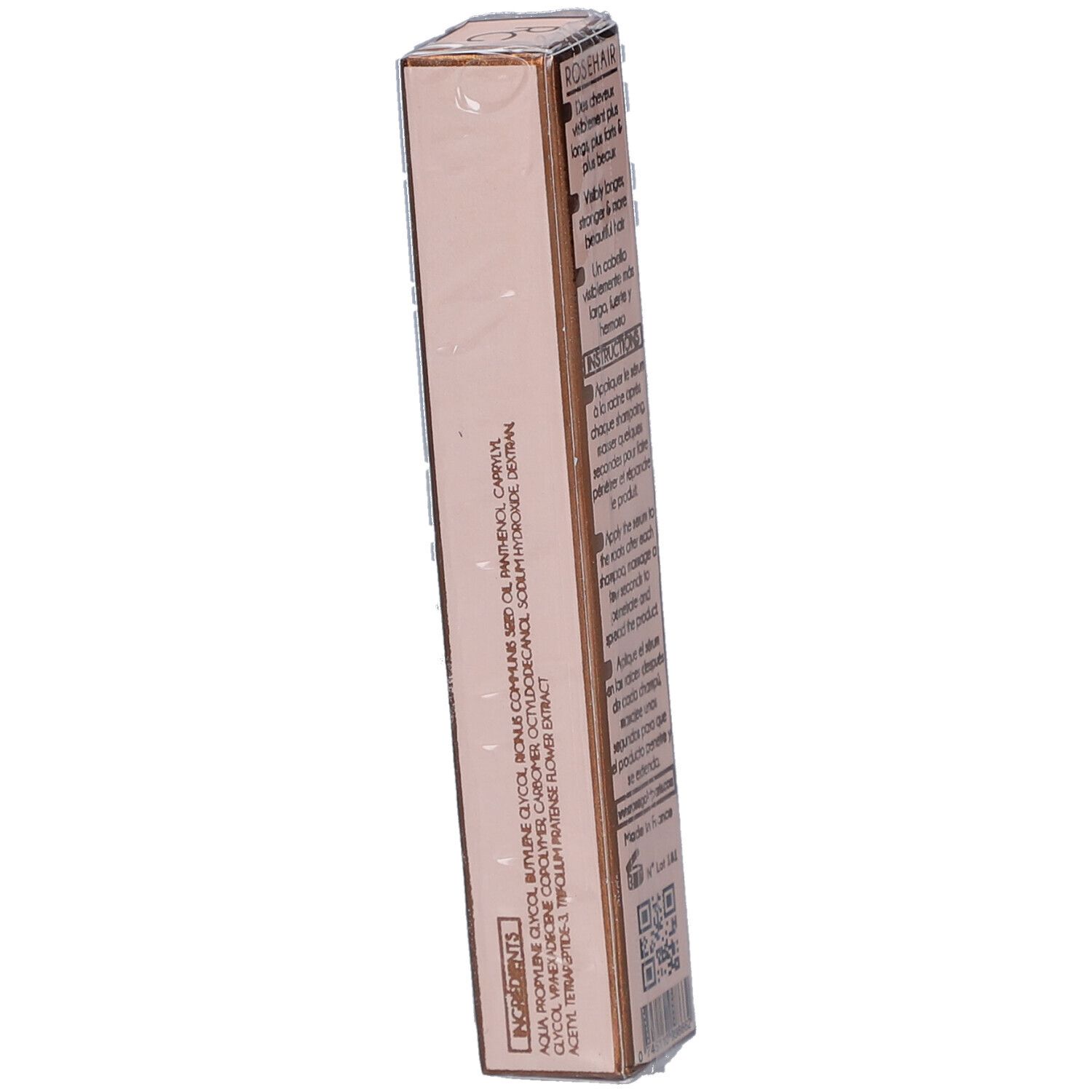 Seite der rosafarbenen Verpackung. Text: Inhaltsstoffe. ROSEHAIR, Sérum de croissance POUR CHEVEUX A.