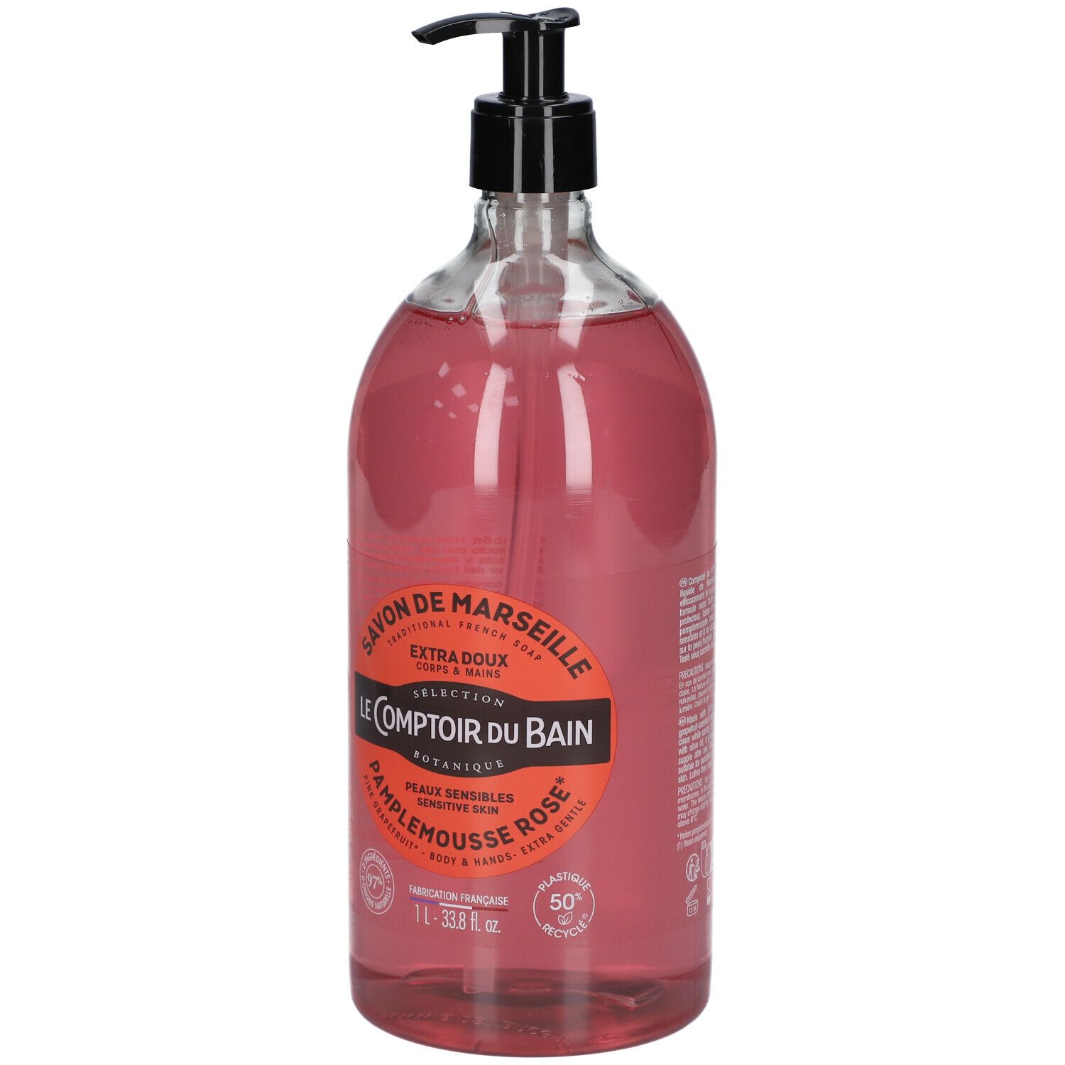 Transparente Flasche mit rosa Flüssigseife und schwarzem Pumpspender. Etikett mit Produktinformationen.