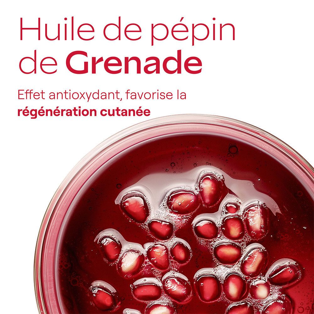 Nahaufnahme von Granatapfelöl. Text: Huile de pépins de Grenade. Antioxidative Wirkung, fördert die Hautregeneration.